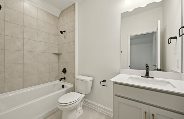 full bathroom featuring tile patterned floors, toilet, vanity, and tiled shower / bath