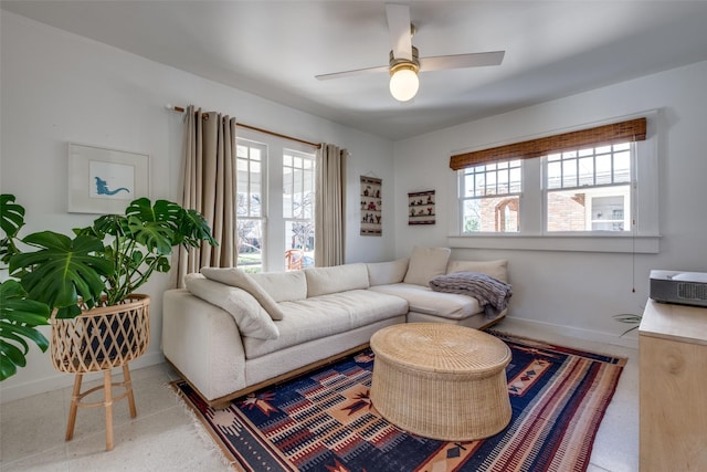 living room featuring ceiling fan