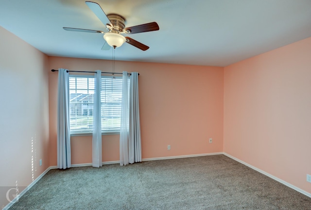 empty room with light carpet and ceiling fan