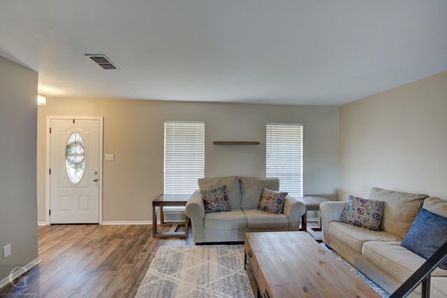 living room featuring dark hardwood / wood-style floors