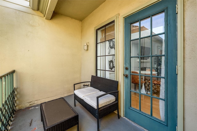 doorway to property featuring a balcony