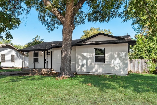 view of front of home with a front yard and a porch