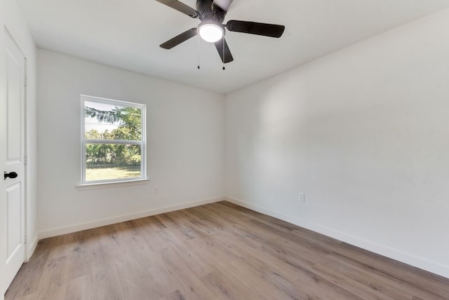 unfurnished room featuring ceiling fan and light hardwood / wood-style floors