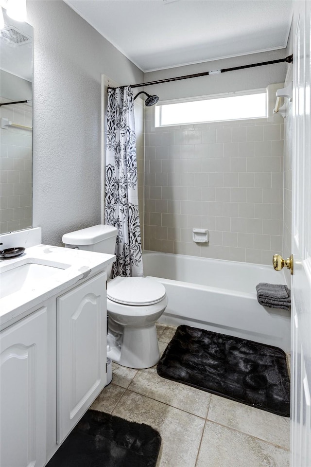 full bathroom with tile patterned flooring, vanity, toilet, and shower / bathtub combination with curtain