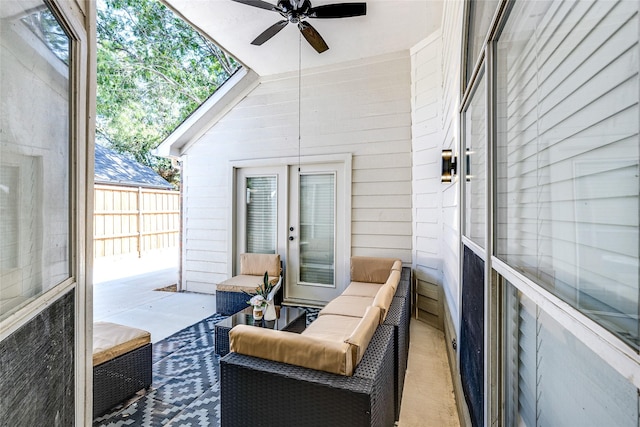 exterior space with outdoor lounge area and ceiling fan