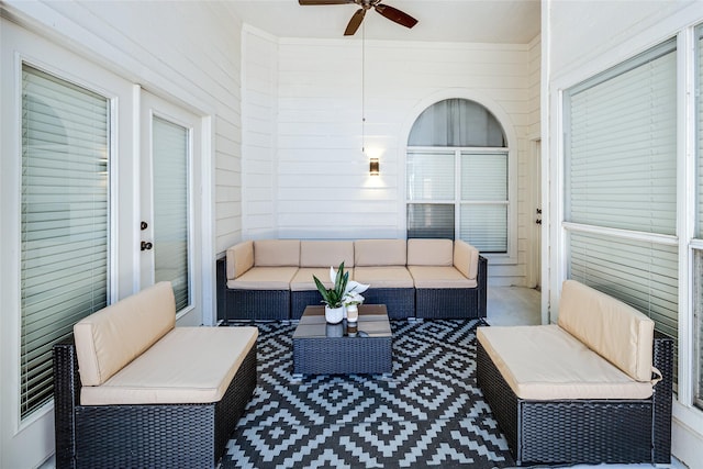 view of patio featuring outdoor lounge area and ceiling fan