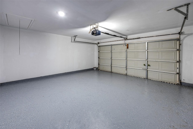 garage featuring a garage door opener