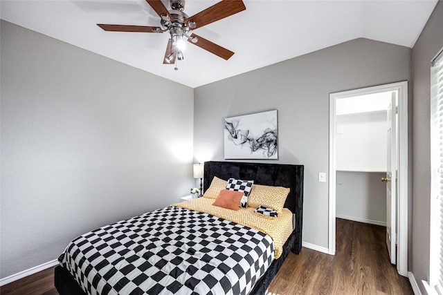 bedroom featuring lofted ceiling, ceiling fan, and dark wood-type flooring