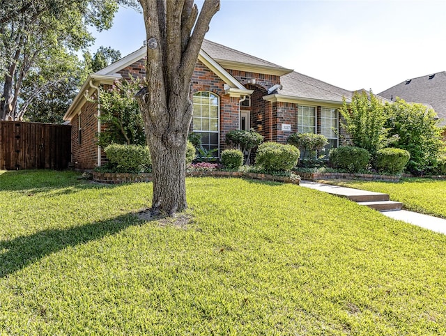 view of front of house with a front lawn