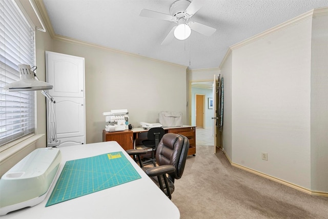 carpeted office featuring a textured ceiling, ceiling fan, and ornamental molding