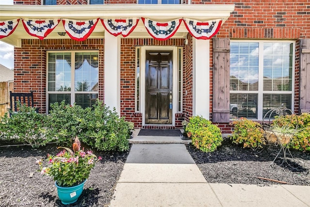 doorway to property with covered porch