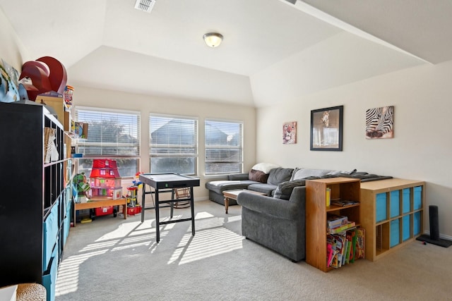 living room with carpet and vaulted ceiling