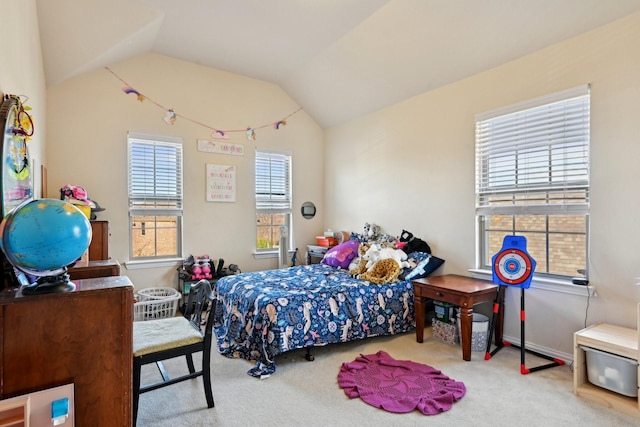 bedroom with multiple windows, light colored carpet, and lofted ceiling