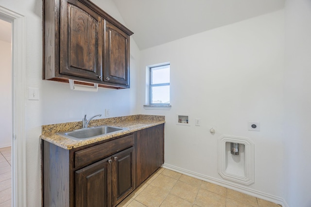 clothes washing area with sink, cabinets, hookup for an electric dryer, gas dryer hookup, and hookup for a washing machine