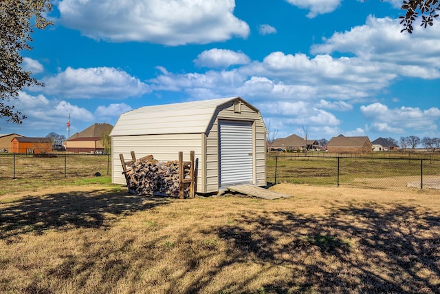 view of outbuilding with a lawn