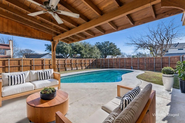 view of pool featuring a patio, outdoor lounge area, and ceiling fan