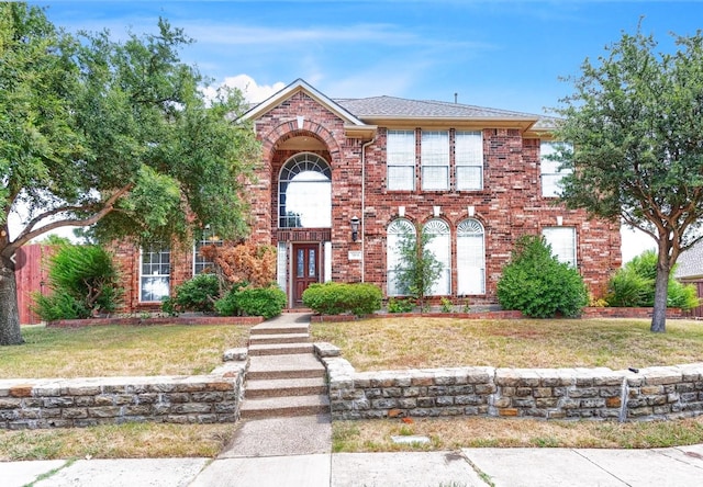 view of front facade with a front lawn