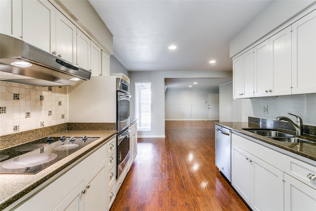 kitchen featuring white cabinets, sink, and appliances with stainless steel finishes