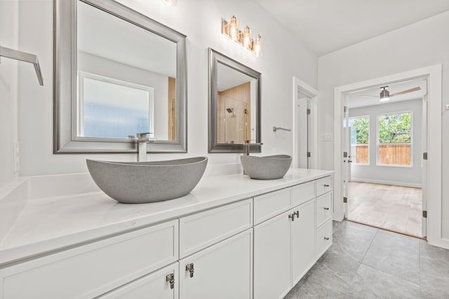 bathroom with vanity and ceiling fan