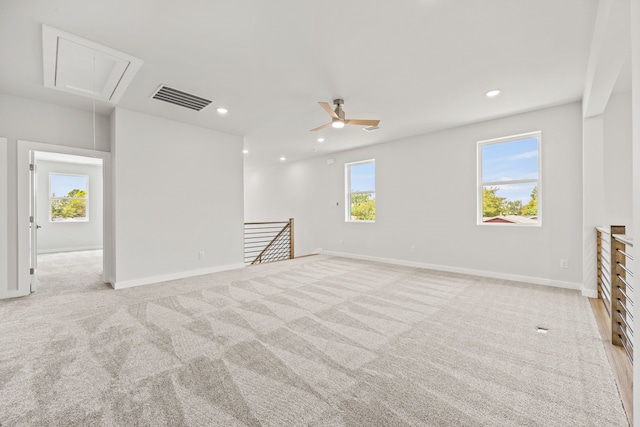 carpeted empty room with ceiling fan