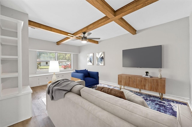 living room featuring beamed ceiling, coffered ceiling, hardwood / wood-style floors, and ceiling fan