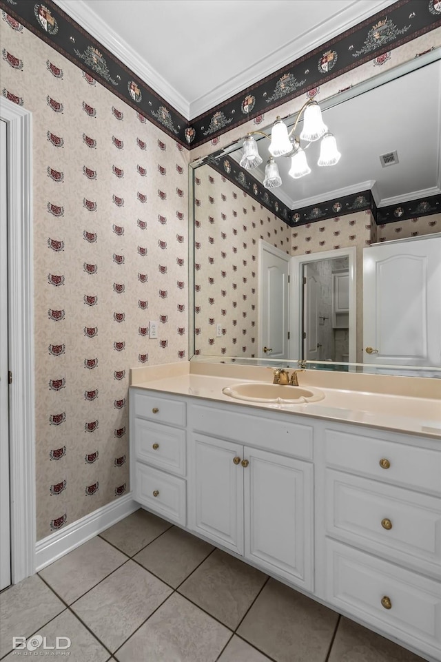 bathroom featuring tile patterned flooring, vanity, and ornamental molding