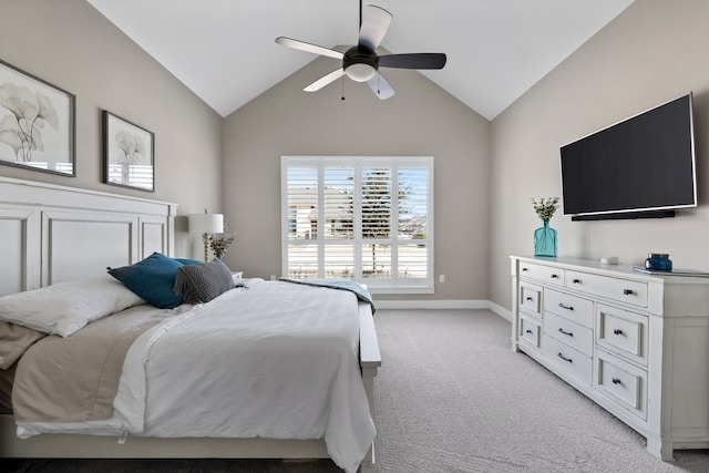 bedroom with lofted ceiling, light colored carpet, and ceiling fan