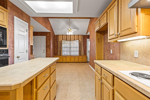 kitchen with a center island, exhaust hood, white electric stovetop, ceiling fan, and black oven