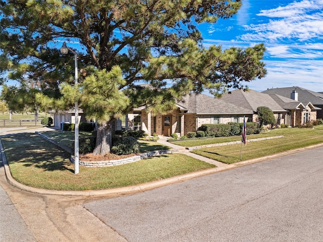 view of front of home with a front yard