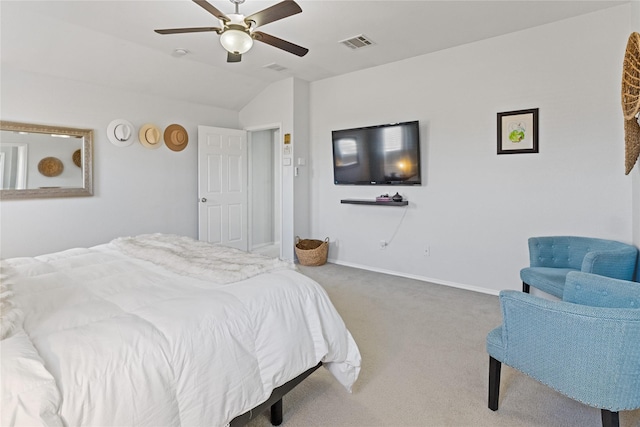 carpeted bedroom featuring ceiling fan and vaulted ceiling