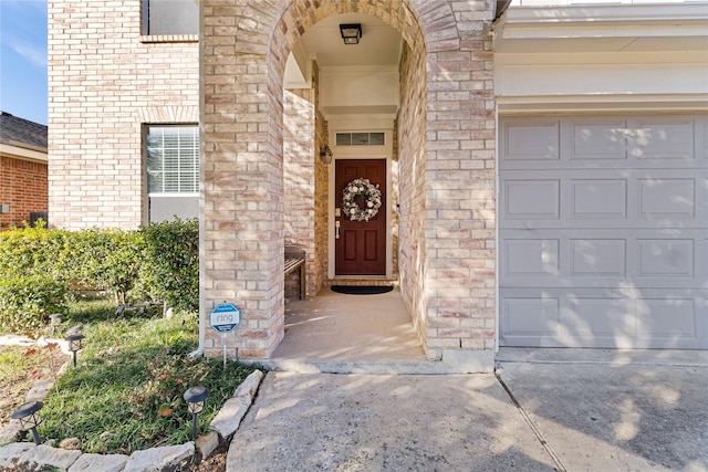 property entrance with a garage