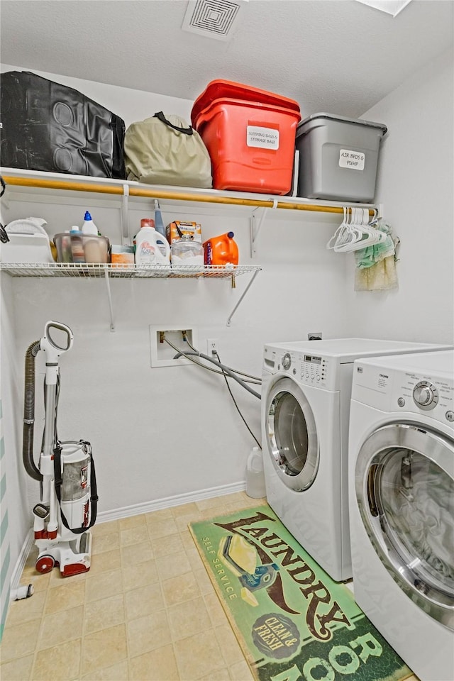 laundry room featuring washer and clothes dryer