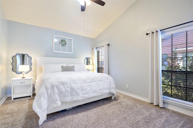 carpeted bedroom with vaulted ceiling and ceiling fan