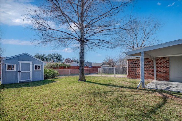 view of yard with a patio and a shed