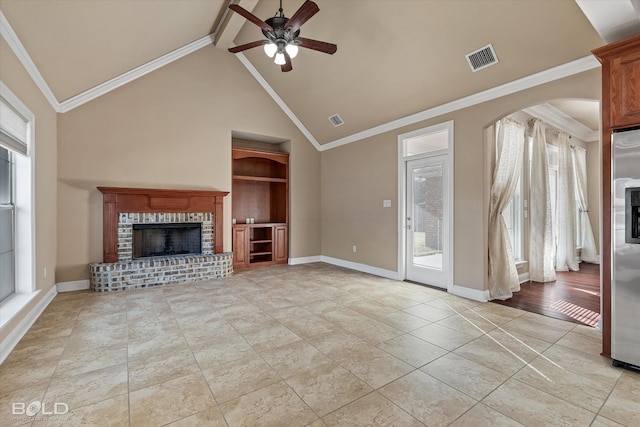 unfurnished living room featuring light tile patterned floors, crown molding, ceiling fan, high vaulted ceiling, and a brick fireplace