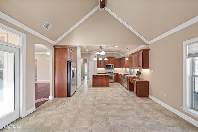 kitchen featuring stainless steel appliances, a center island, ornamental molding, decorative backsplash, and decorative light fixtures