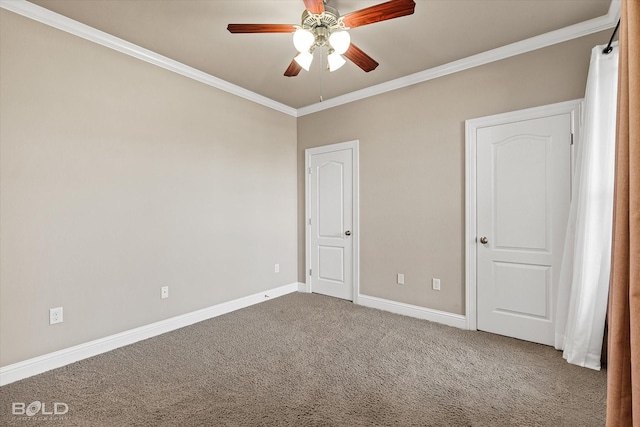 carpeted spare room with crown molding and ceiling fan