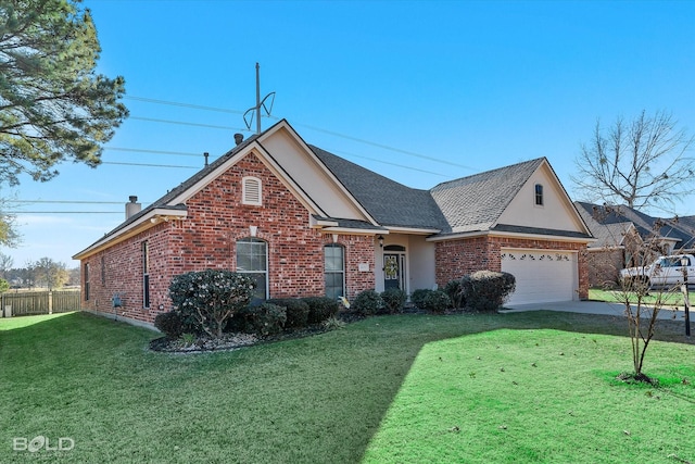 view of front facade with a garage and a front yard