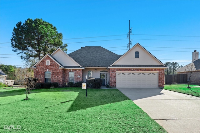 view of front of house featuring a garage and a front lawn