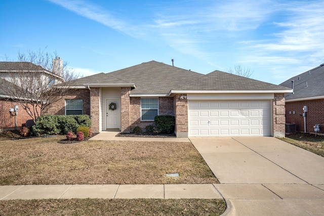 single story home with a front lawn and a garage