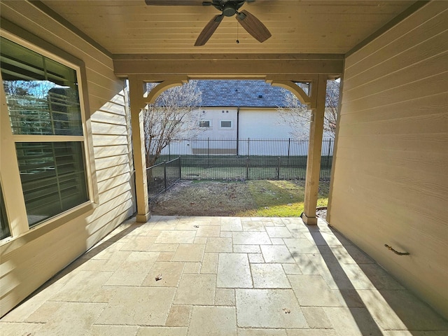 view of patio featuring ceiling fan