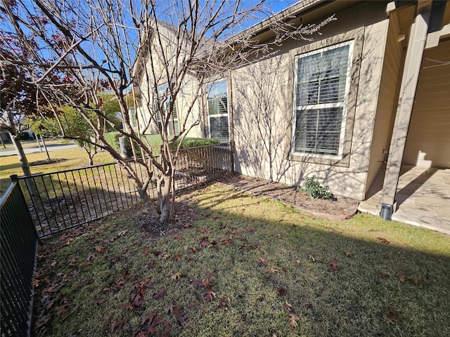 view of property exterior featuring a yard