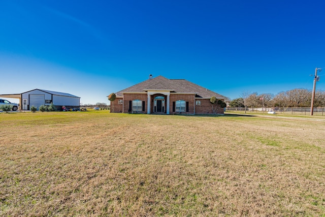 view of front of property with a front yard