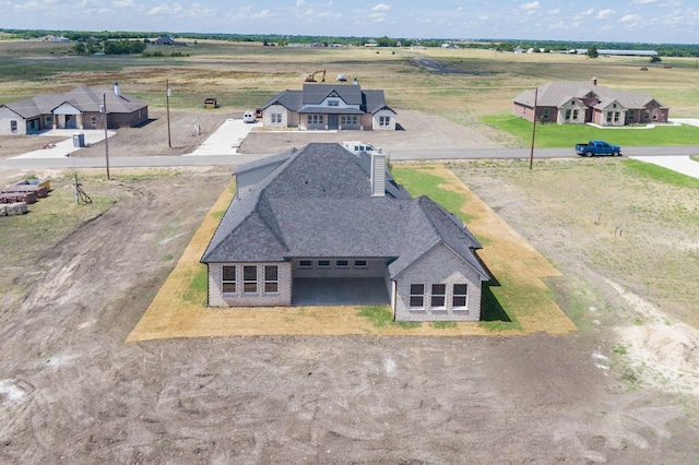 bird's eye view with a rural view