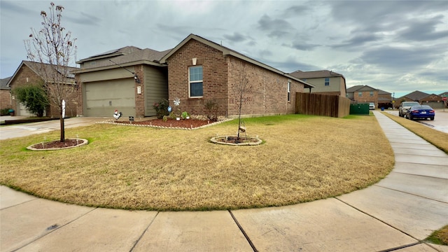 view of home's exterior with a garage and a yard