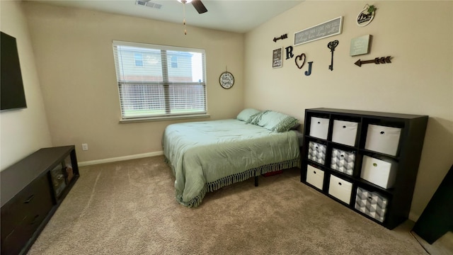 carpeted bedroom with ceiling fan