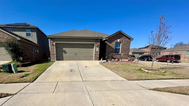 view of front facade with a garage and a front lawn