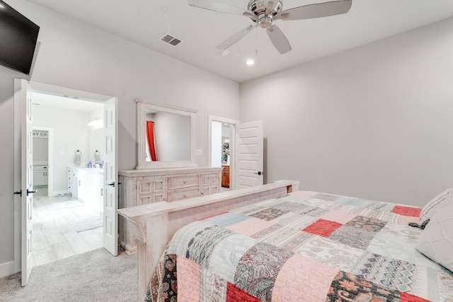 carpeted bedroom with ceiling fan