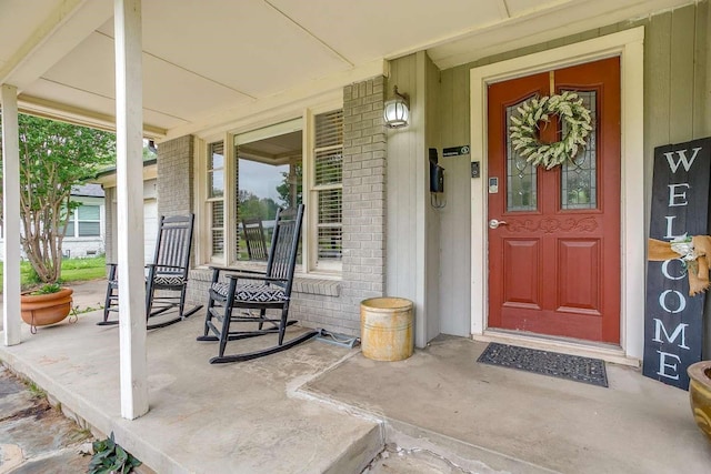 entrance to property with covered porch