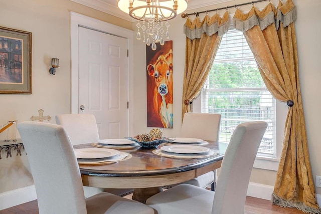 dining room featuring dark wood-type flooring and a notable chandelier